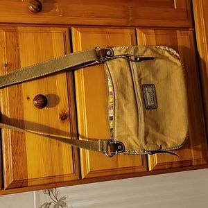 Canvas crossbody handbag.couple of marks on the fabric as seen in picture #3